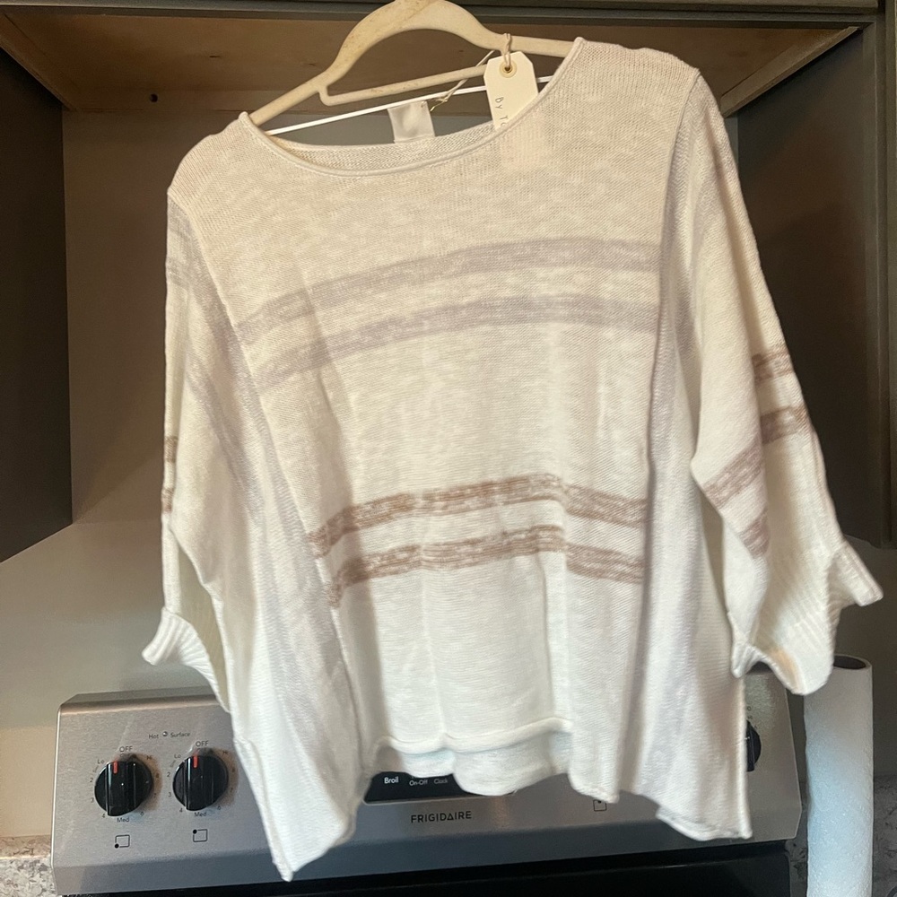 White sweater with tan and gray stripes. Oversized/flowy